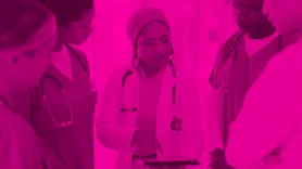 leadership discussing elearning training programs with medical staff