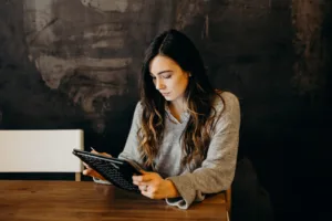 woman holding a tablet