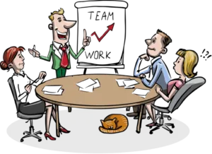 Cartoon of a team around a table. Chart reads "team work"