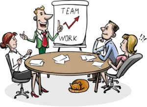 Cartoon of a team around a table. Chart reads "team work"